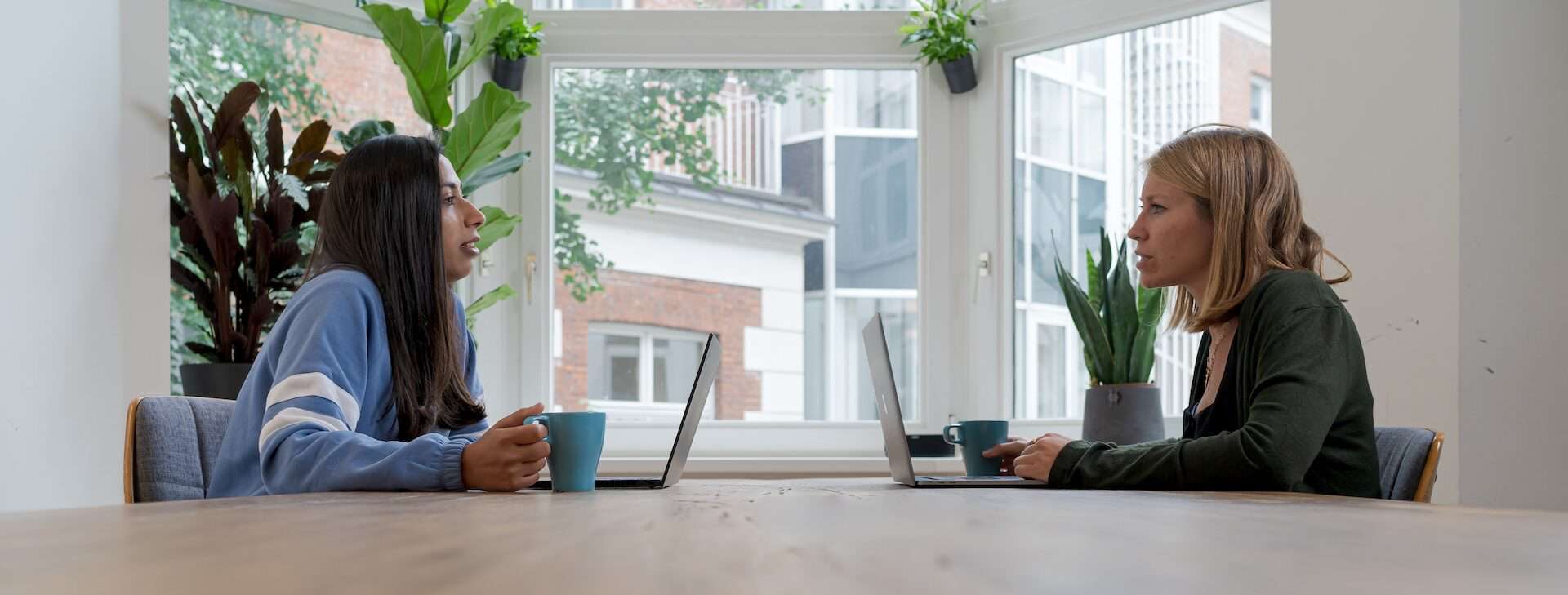 two women talking on a podcast